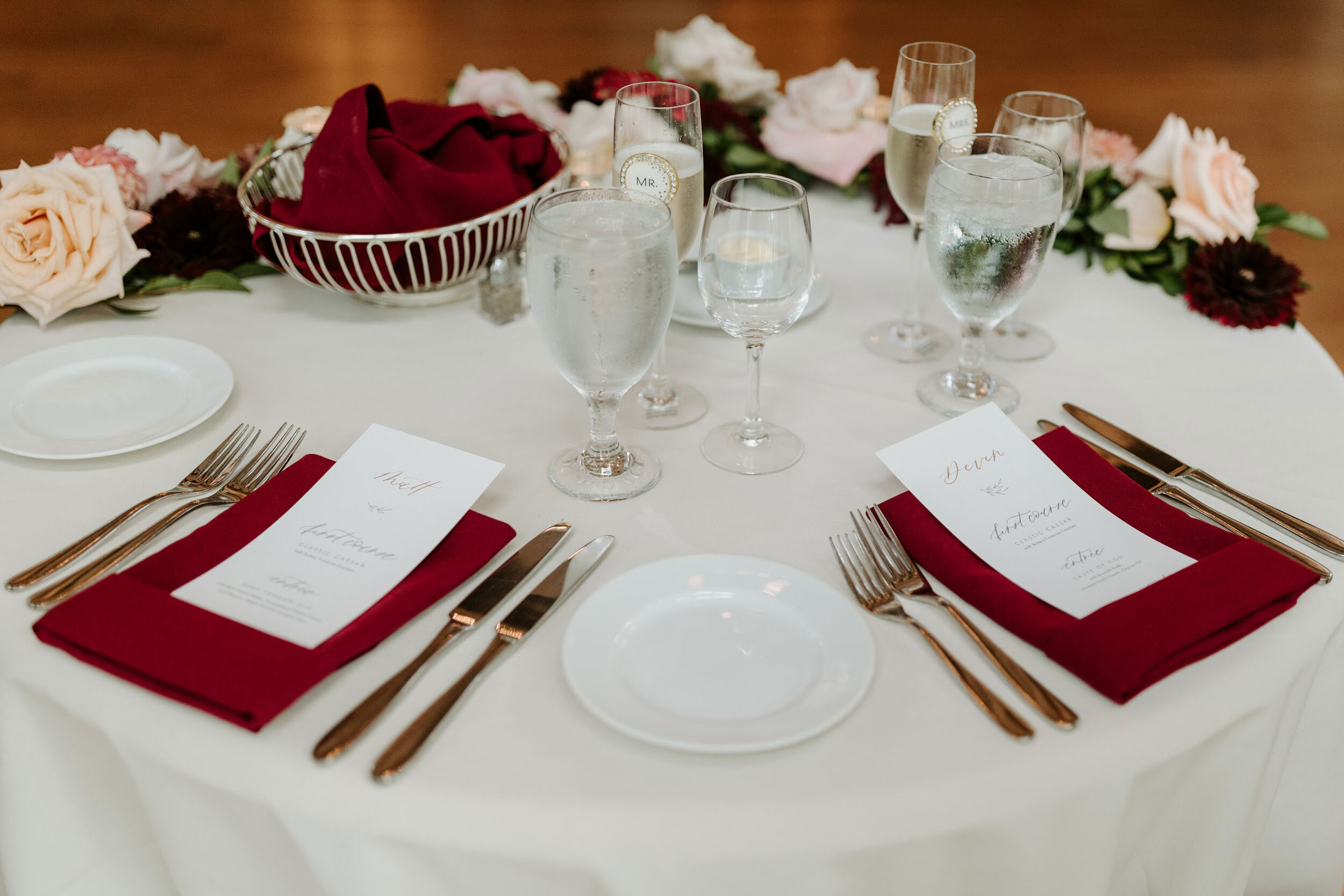 Custom wedding menus with gold guest names