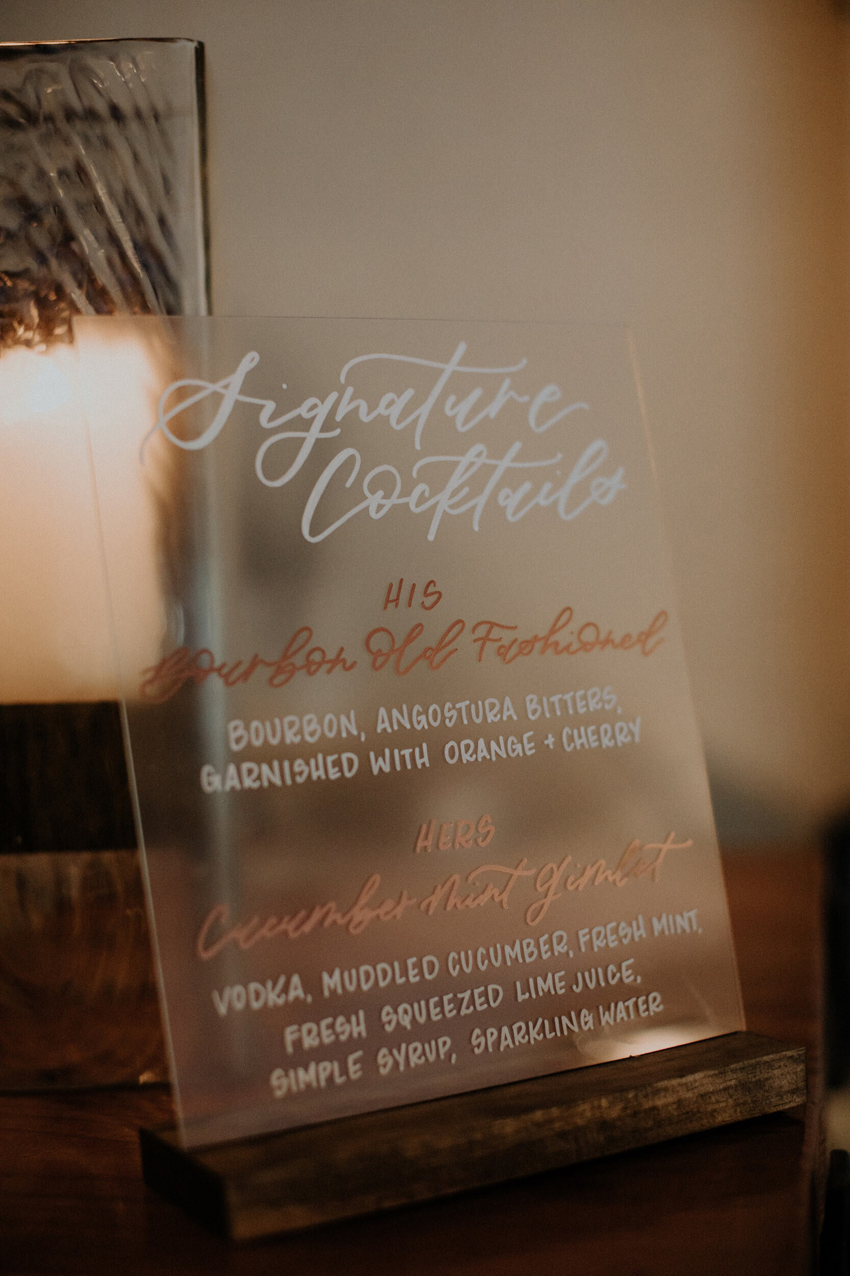 modern acrylic signature cocktails sign with copper ink and wood base