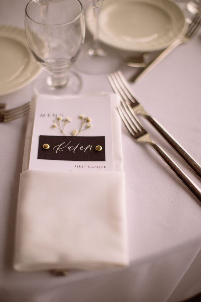 wedding calligraphy menu with a baby's breath accent - how to start your wedding stationery business 