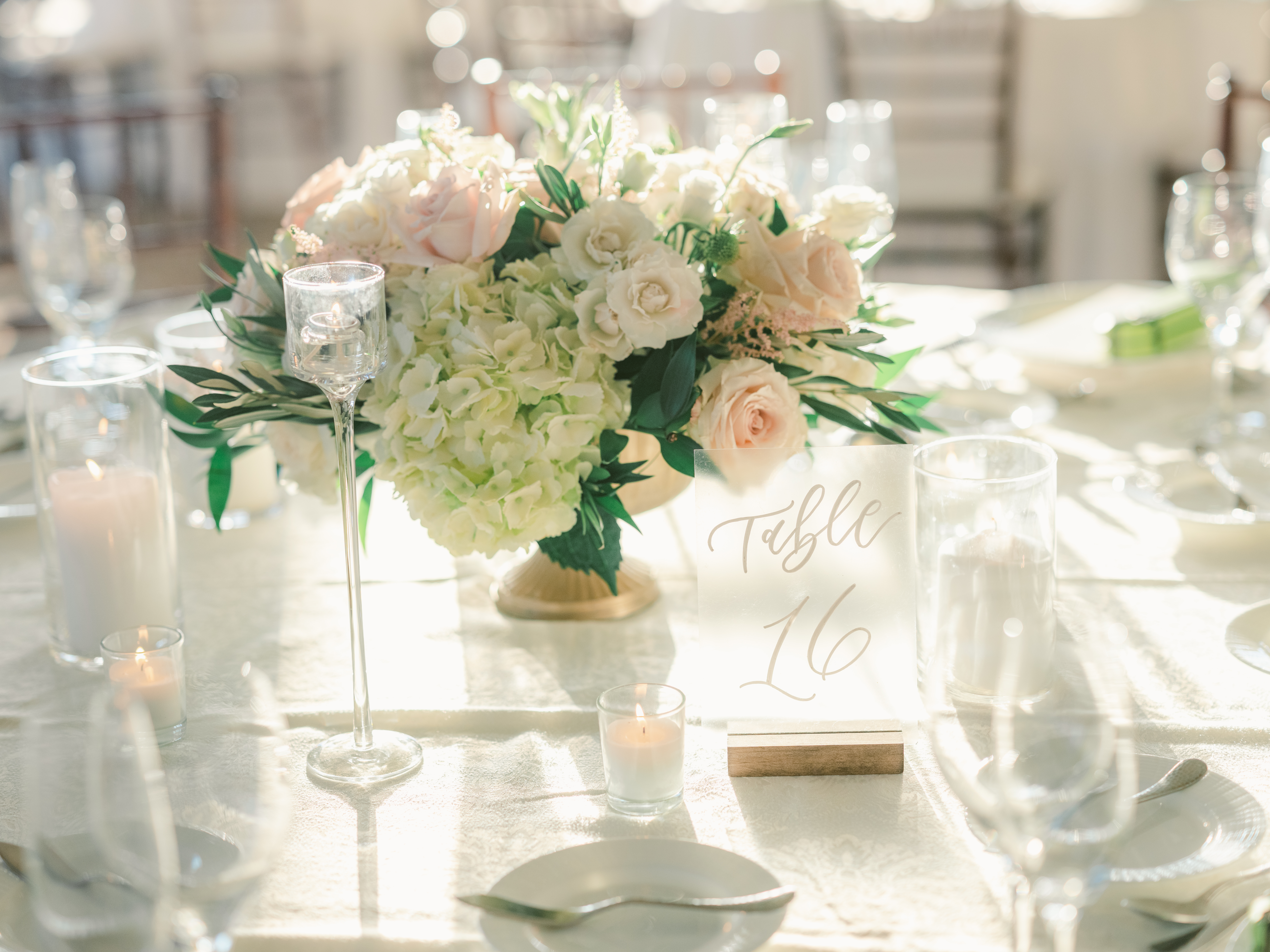 wedding stationery table number with flowers and candles 